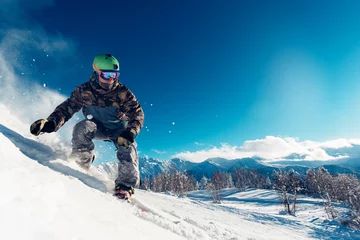 Papier Peint photo Lavable Sports dhiver snowboarder is sliding with snowboard
