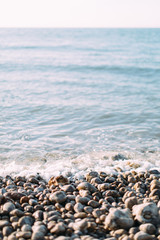 Closeup and detail of amazing row of white stones on the ocean, Etretat, Normandy, France