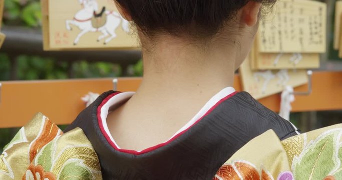 The Bare Nape of a Japanese Woman wearing a Kimono