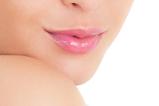 Beautiful female lips. Part of the face. Photo closeup