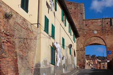 Siena, Porta Fontebranda medieval gate to the historical town, Tuscany, Italy