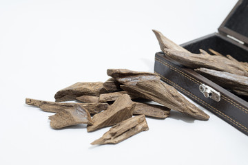 Agarwood, incense Chips around a leather box, it's name in Arabic Oud Wood used to incense Cloths,...