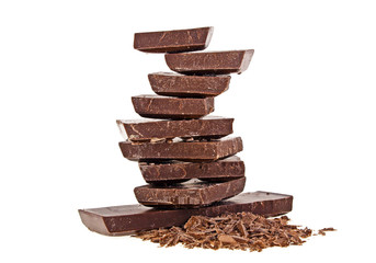 Chocolate bars and chocolate chips on a white background