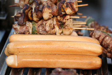 Vienna sausage and pork ribs cooked on the grill in the street f