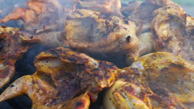 Grilled chiket Tabaka on the fire