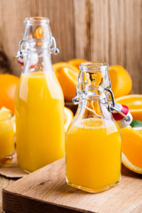 Freshly squeezed orange juice in bottles