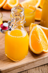 Freshly squeezed orange juice in bottles