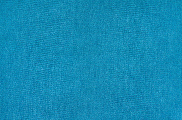 Texture of blue synthetic fabric. Pile background image.