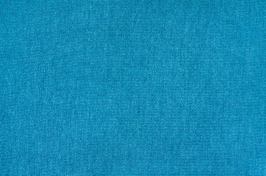 Texture of blue synthetic fabric. Pile background image.