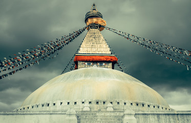 Nepal Religion Culture. Boudhanath Stupa with eyes and colorful prayer flagsin the Kathmandu...