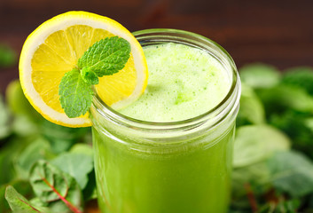 Fresh Organic Green Juice with Lemon Slice and Mint