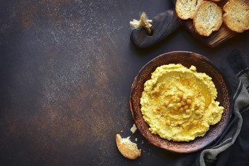 Homemade traditional lebanese chickpea hummus.Top view with copy space.