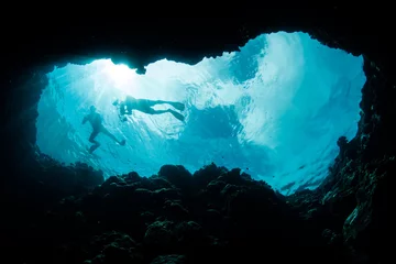 Fotobehang Snorkelers Exploring Blue Hole © ead72