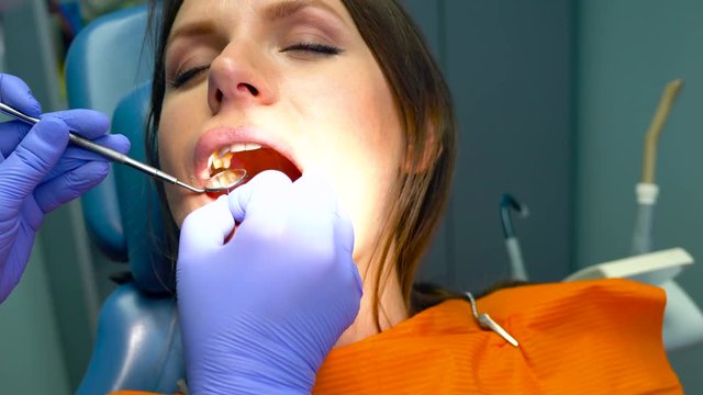 Closeup woman getting a dental treatment