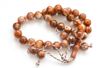 brown beads isolated on white