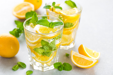 Lemon mojito cocktail with fresh mint, cold refreshing summer drink or beverage with ice