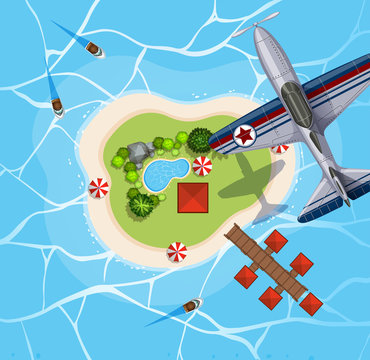 Top view of airplane flying over island
