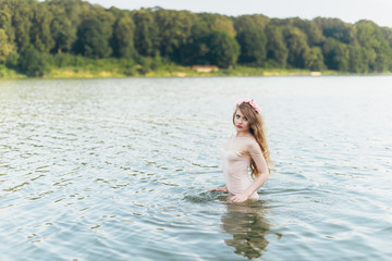  Girl with a wreath in the water