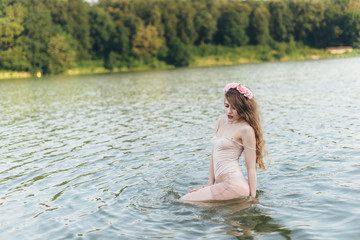  Girl with a wreath in the water