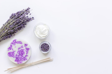 body cream with lavender herbs cosmetic white background top view mock-up