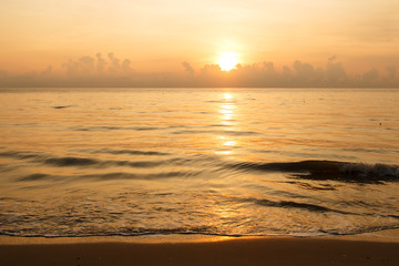 Sunset over sea and beach