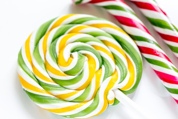 Fototapeta na wymiar sweets and sugar candies on white background pattern