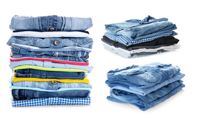 Stacks of folded clothes on white background
