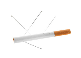 Cigarette with needles on white background