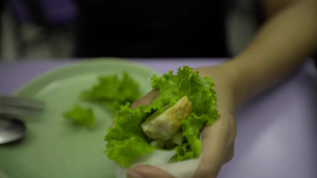woman eating Vietnam cuisine