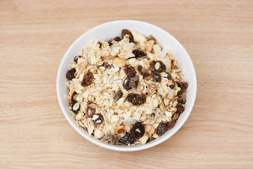 Muesli in a white bowl