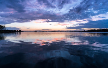 The calm and warm evening on Lake Norman just after sun set. Conveniently located close to Charlotte, North Carolina. 