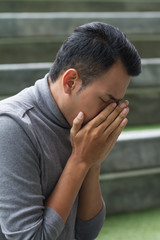 allergic sick asian man sneezing