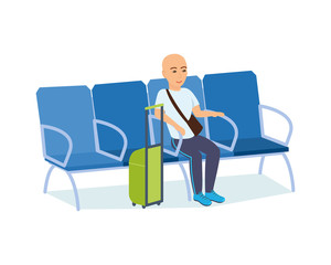 Man with luggage in hands in armchair of the airport.