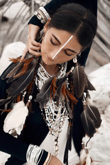 close up of attractive boho woman outdoors