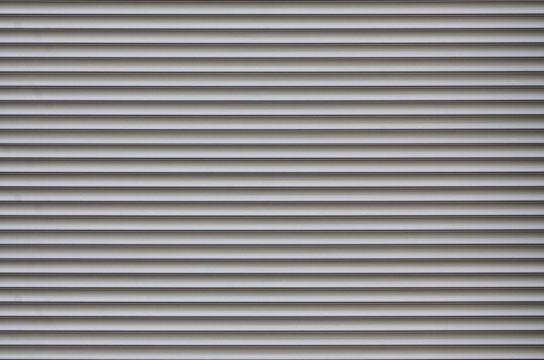 The Texture Of The Shutter Door Or Window In Light Gray Color