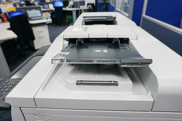 close up multifunction printer tray in office with selective focus