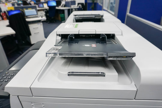 close up multifunction printer tray in office with selective focus