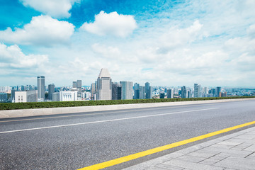 empty road with cityscaep of modern city