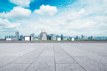 empty floor with cityscape of modern city