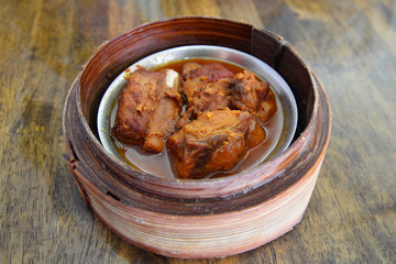 Steam pork dumpling in bamboo basket, Chinese traditional food.