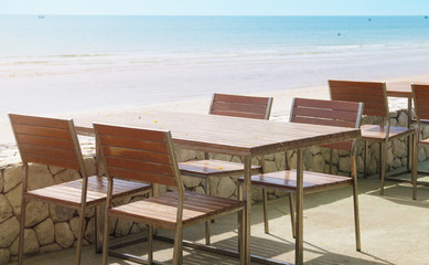 Restaurant table with sea beach background , relax place for eating