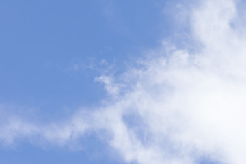 white fluffy clouds in the blue sky
