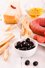 Grissini breadsticks with salami.