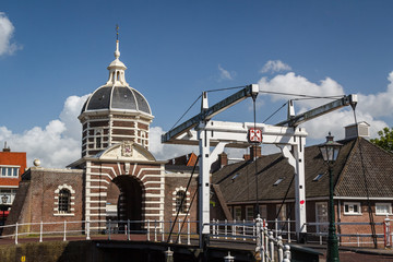 Fototapeta na wymiar Old bridge and Sea gate of fortifications in Leiden, Netherlands