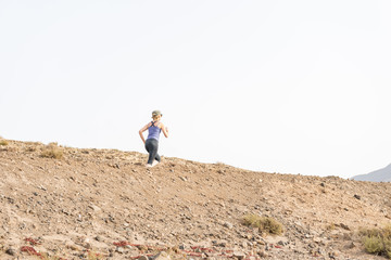 Naklejka premium Active Lady on a Desert Run in the Morning