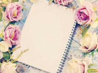notebook background with bouquet of flowers vintage filters