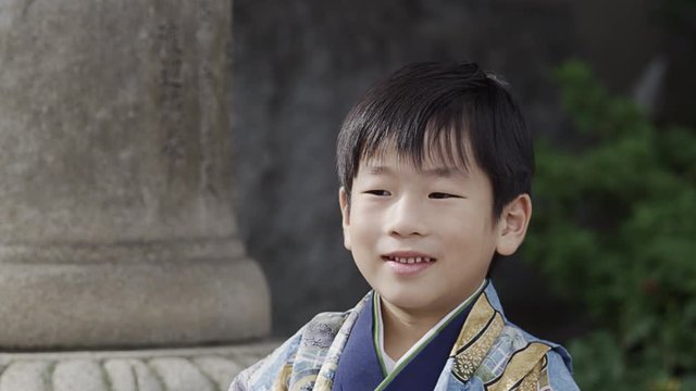 A five year old boy dressed up in a Hakama to celebrate the Shichi-Go-San Festival