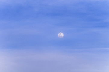 background of blue sky with the moon