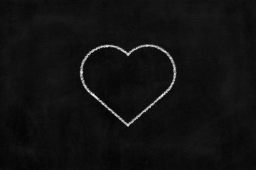 Heart Chalk Drawing on Chalkboard Background.