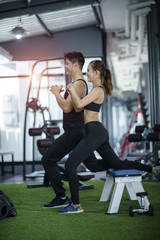 Fototapeta na wymiar couple lover active exercise together in gymnasium